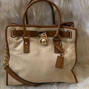 Brown and gold Micheal Kors cloth hand bag